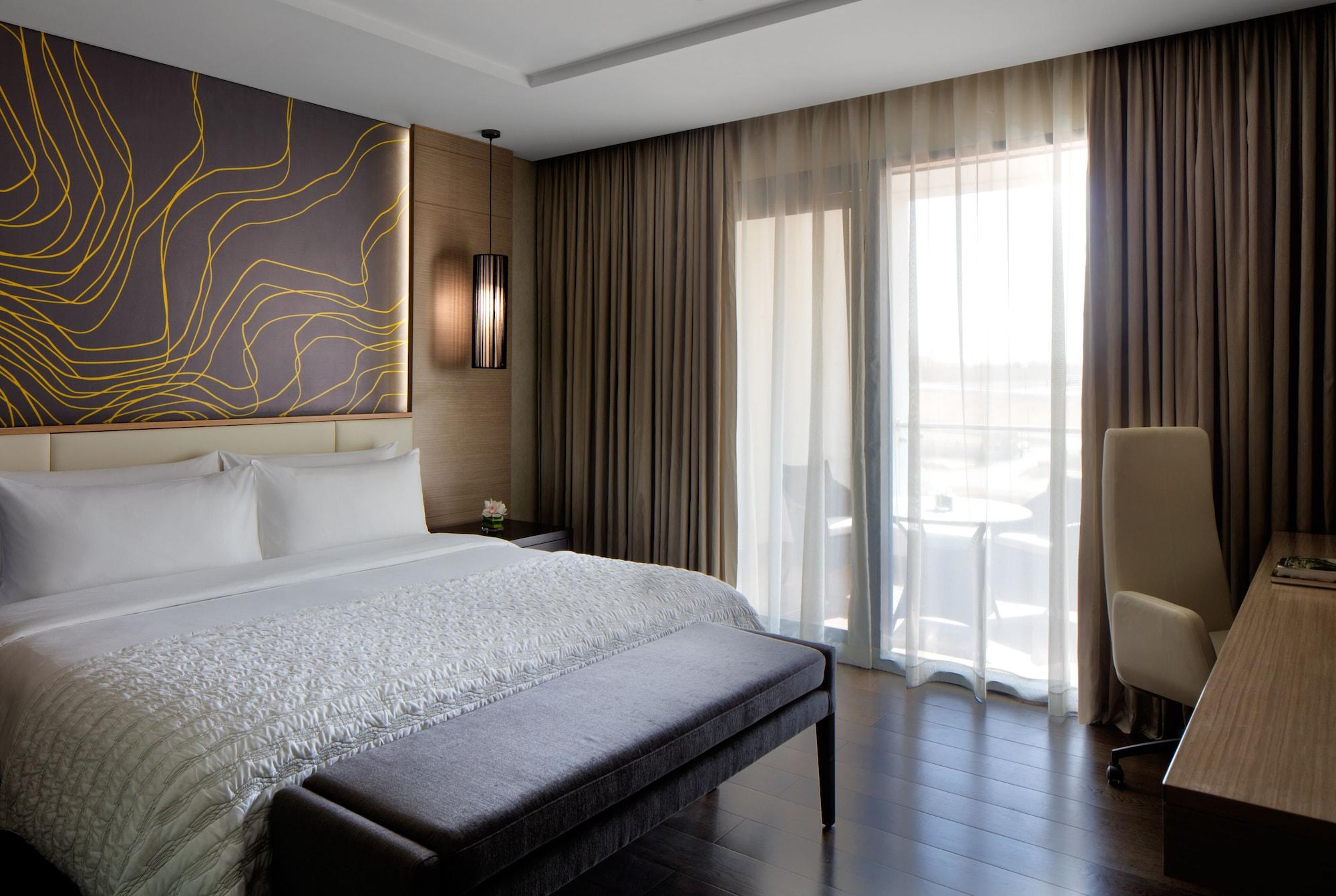 马斯喀特雷迪森霍尔木兹大酒店酒店 外观 照片 A bedroom at the hotel